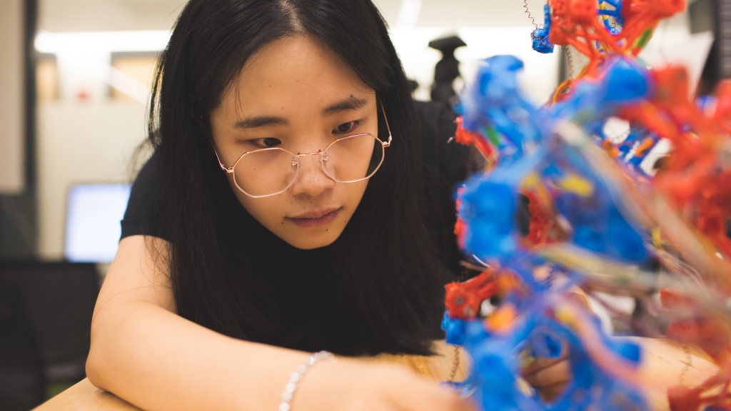 PhD student Luyang Zhao works with soft robotic modules