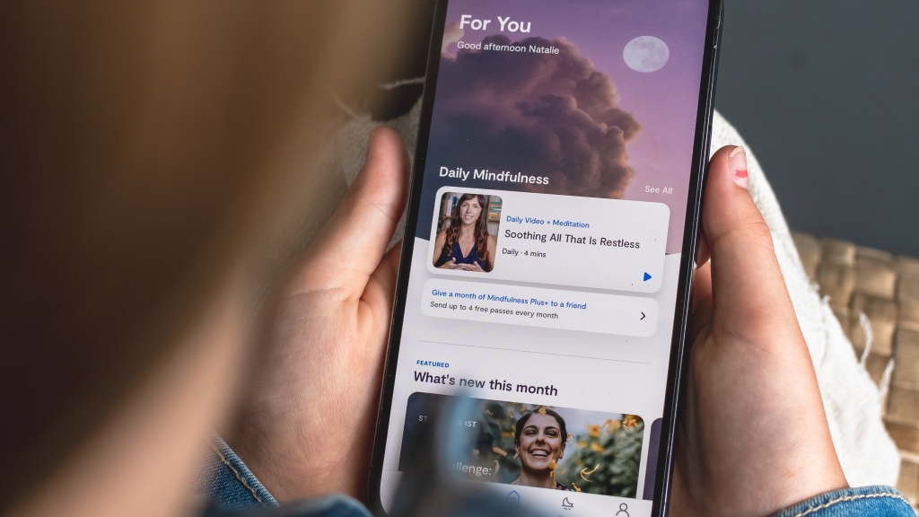 Person using mobile app for mindfulness